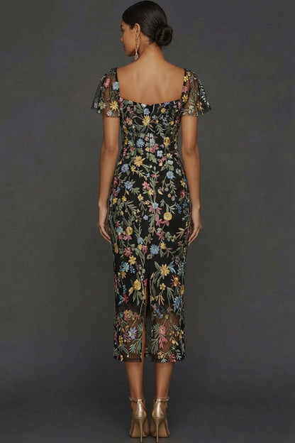 ILYNORA black floral embroidered tulle midi dress, back view of sheath silhouette