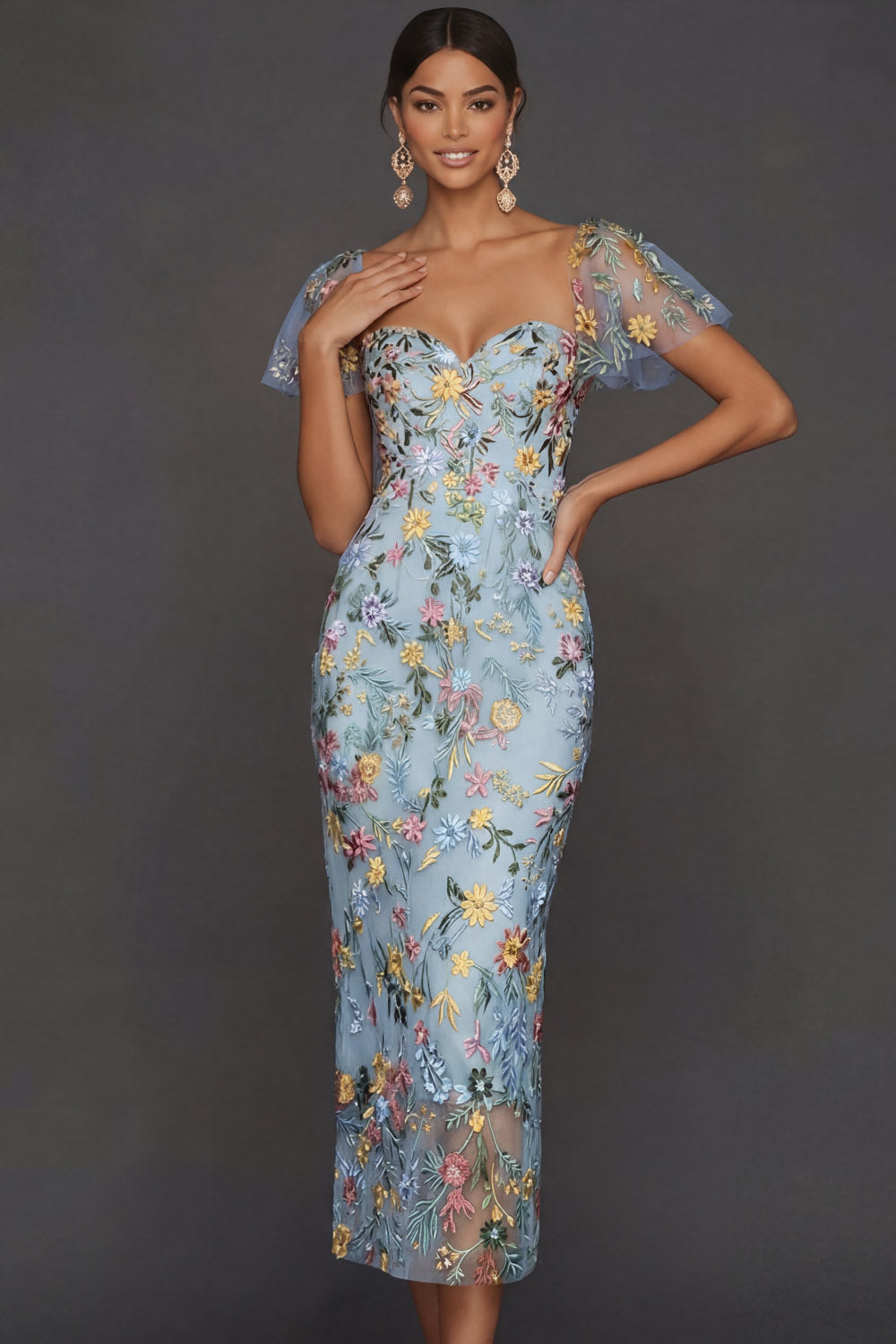 ILYNORA blue floral embroidered tulle midi dress, model wearing dress from the front