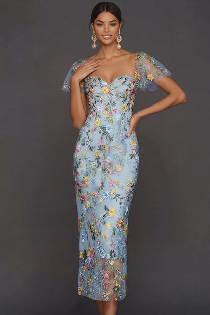 ILYNORA blue floral embroidered tulle midi dress, model wearing dress from the front