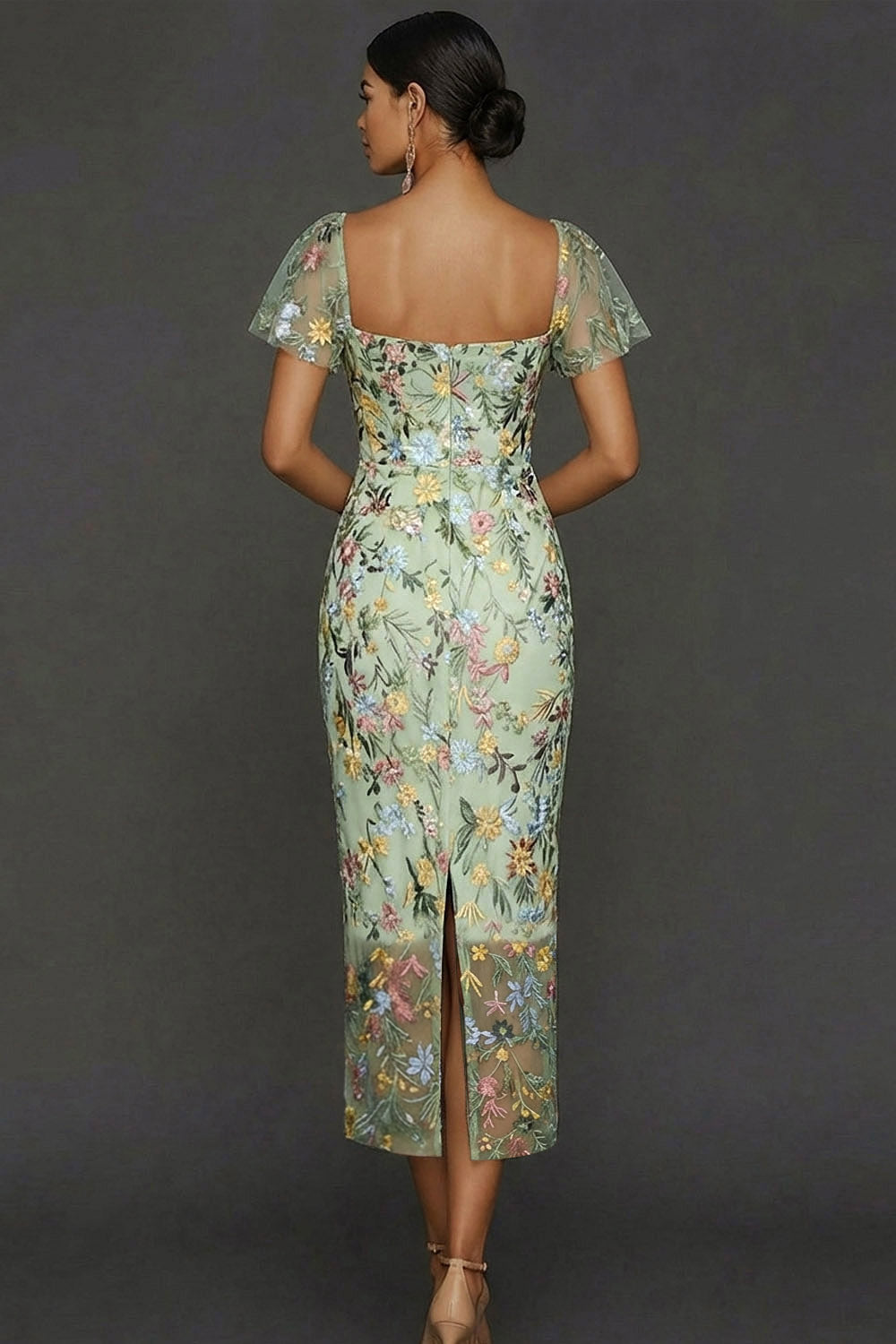 ILYNORA green floral embroidered tulle midi dress, back view of sheath silhouette