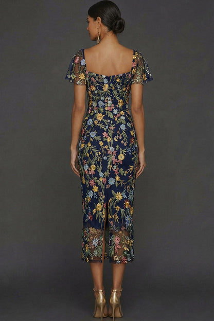 ILYNORA navy floral embroidered tulle midi dress, back view of sheath silhouette
