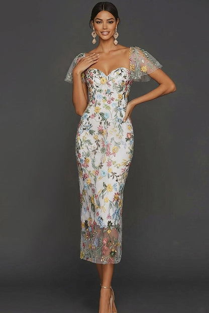 ILYNORA white floral embroidered tulle midi dress, model wearing dress from the front
