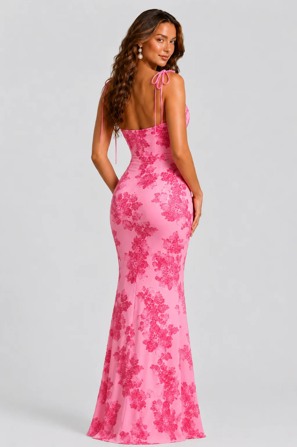 Back view of women's pink floral embroidered tie strap maxi dress with flattering fitted silhouette and floor length skirt by ILYNORA