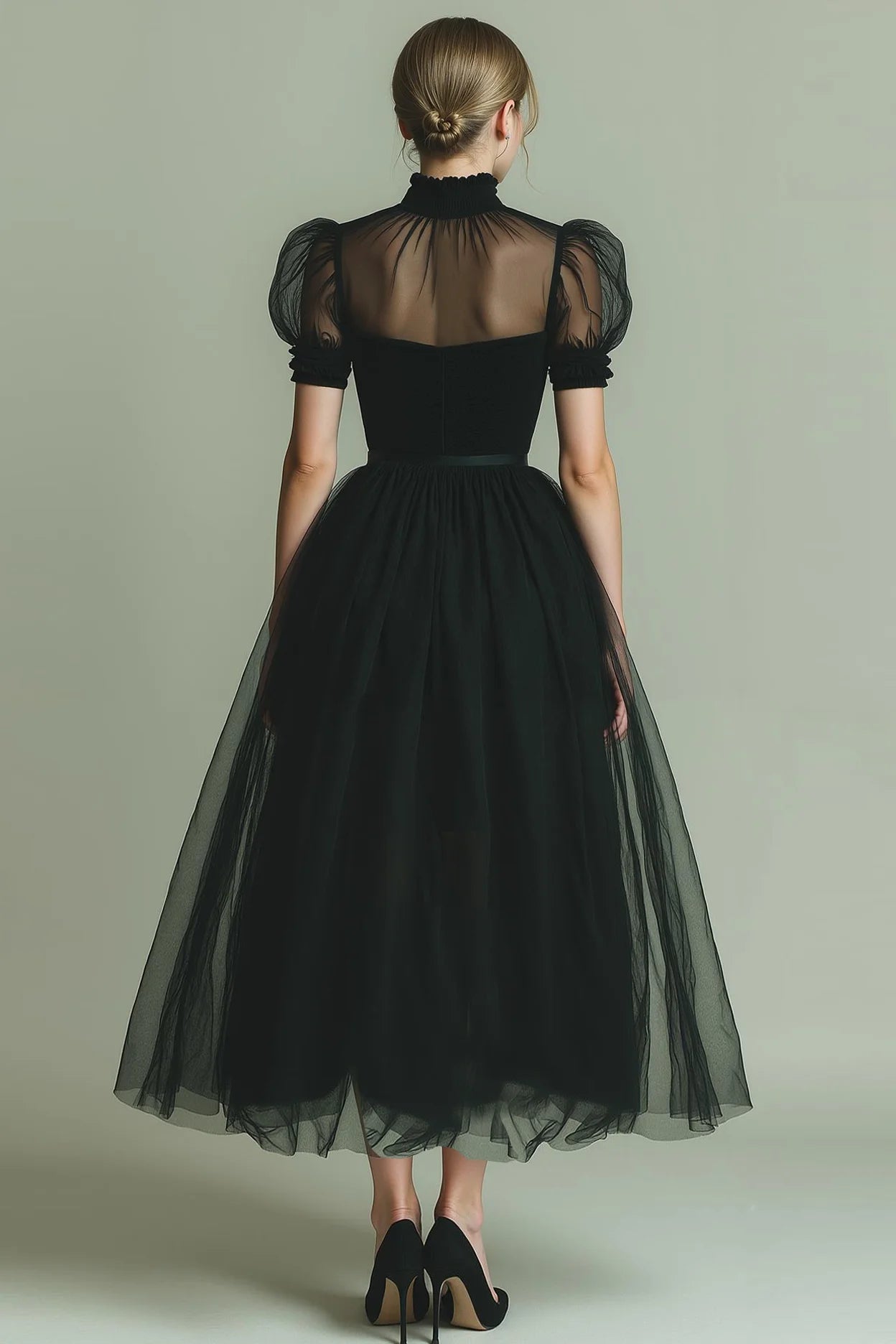 ILYNORA black high neck tulle midi evening dress from the back.