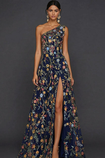 ILYNORA navy one shoulder floral prom maxi dress, model wearing gown from the front