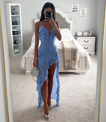 Women's blue tiered ruffle high-low maxi dress with wrap bodice, cascading layered ruffles and asymmetric hem by ILYNORA