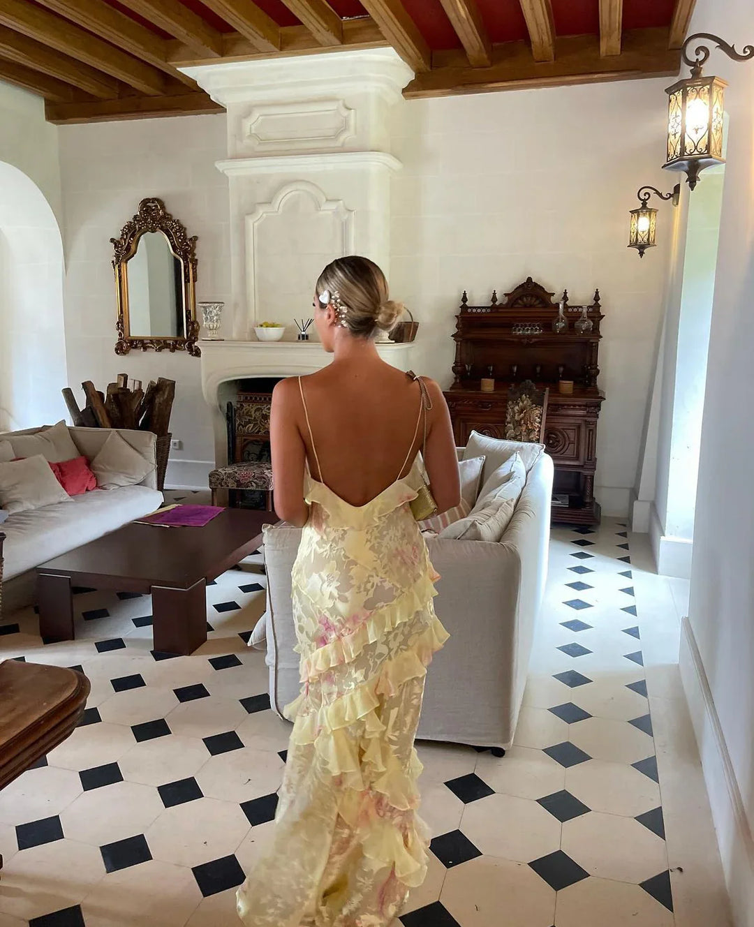 ILYNORA yellow floral ruffle maxi dress with open back, styled for weddings, holidays and summer occasions
